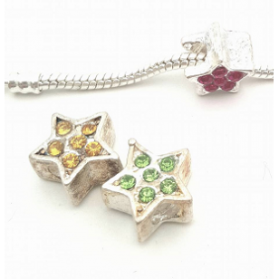 Kraal ster met groot gat en strass stenen - Luxe