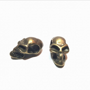 Kraal Skull 17x9mm brons